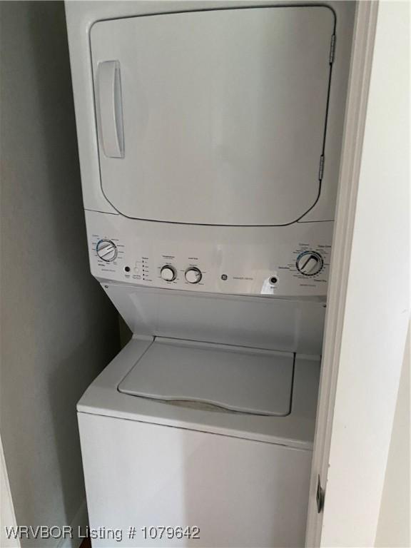 518 N Coker St Unit A & B, Greenwood, AR 72936 - laundry room featuring laundry area and stacked washer / dryer