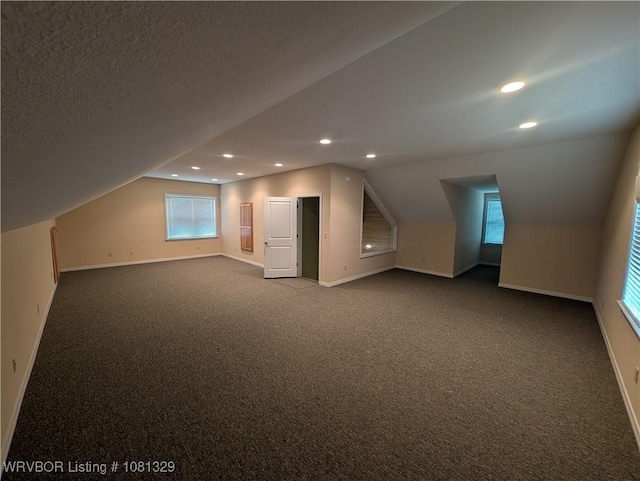1385 Old Airport Rd, Paris, AR 72855 - bonus room featuring vaulted ceiling, baseboards, recessed lighting, carpet, and healthy amount of natural light