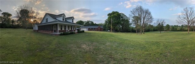 1385 Old Airport Rd, Paris, AR 72855 - view of grassy yard featuring a porch