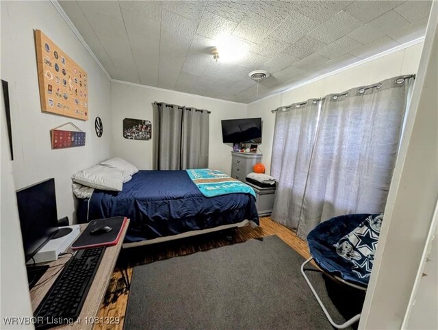 1385 Old Airport Rd, Paris, AR 72855 - bedroom featuring crown molding and wood finished floors