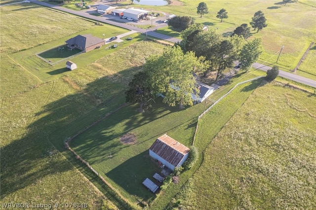 birds eye view of property featuring a rural view