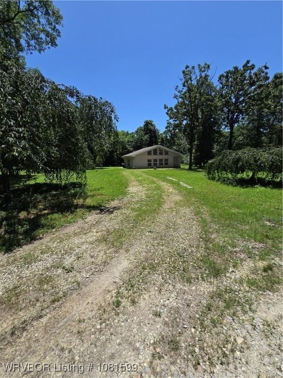 20222 Garman Rd, Gentry, AR 72734 - view of green lawn with driveway