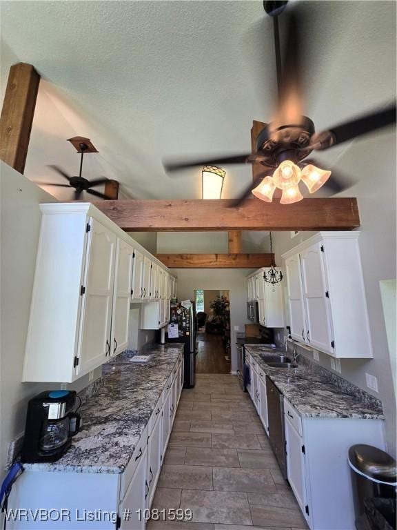 20222 Garman Rd, Gentry, AR 72734 - kitchen featuring a ceiling fan, white cabinets, appliances with stainless steel finishes, and stone countertops