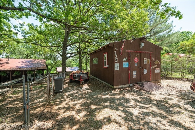 175 Sulphur City Rd, Fayetteville, AR 72701 - view of side of home featuring an outdoor structure