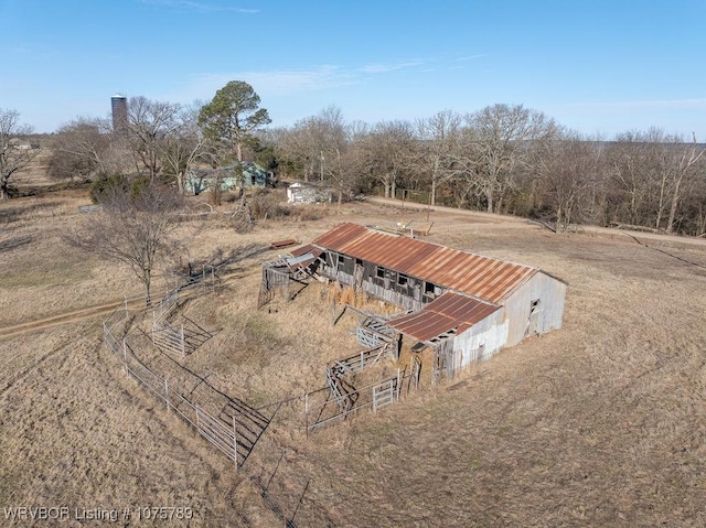 birds eye view of property with a rural view