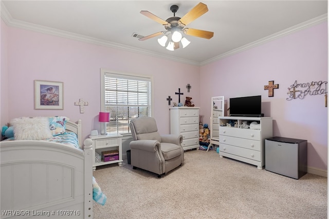 carpeted bedroom with stainless steel fridge, ornamental molding, and ceiling fan