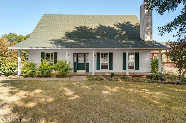 view of front of home with a front lawn and covered porch