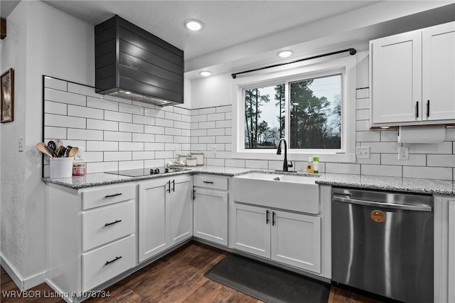 kitchen with light stone countertops, sink, dishwasher, black electric stovetop, and white cabinets