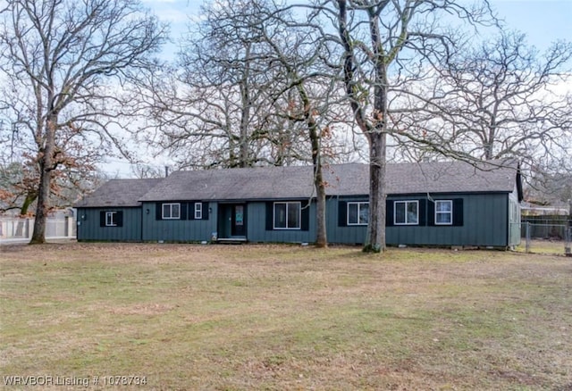 ranch-style house with a front yard