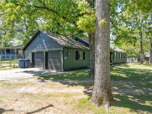 detached garage with fence