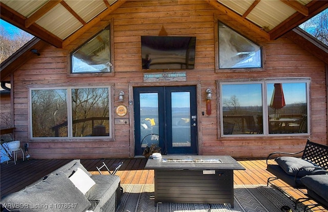 entrance to property with a wooden deck