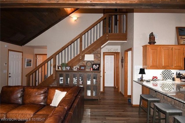 living room with wood ceiling, vaulted ceiling, and dark hardwood / wood-style floors