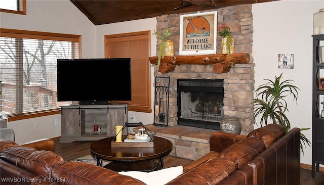 living room with a stone fireplace, wooden ceiling, hardwood / wood-style floors, and lofted ceiling