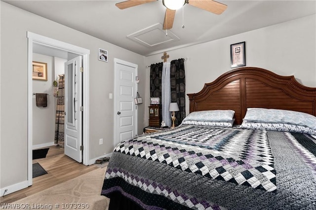 bedroom featuring light hardwood / wood-style floors and ceiling fan