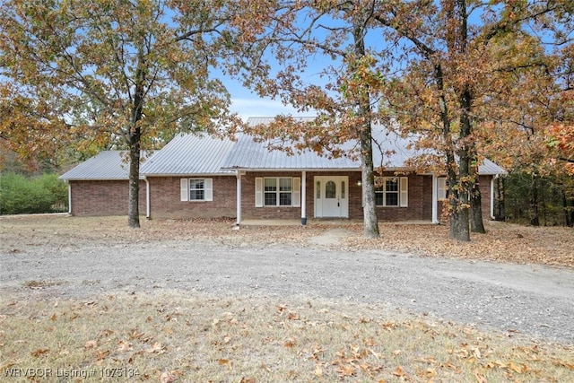 ranch-style house featuring a porch