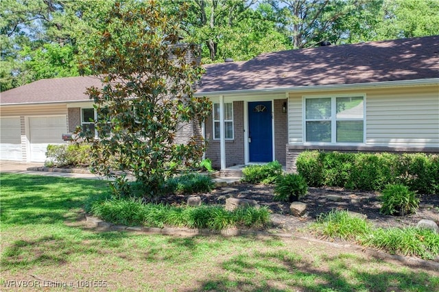 70 Haven Dr, Fort Smith, AR 72901 - ranch-style home with brick siding, a garage, a front lawn, and concrete driveway