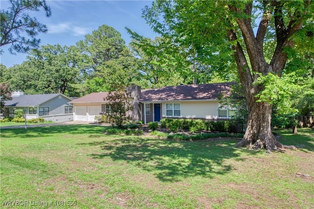 70 Haven Dr, Fort Smith, AR 72901 - ranch-style home with a front yard, a chimney, and an attached garage