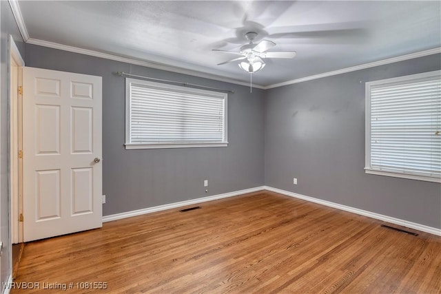 70 Haven Dr, Fort Smith, AR 72901 - empty room with light wood-style floors, ceiling fan, baseboards, and ornamental molding