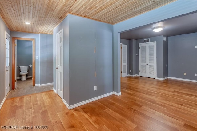 70 Haven Dr, Fort Smith, AR 72901 - hall with light wood-style flooring, baseboards, and wood ceiling
