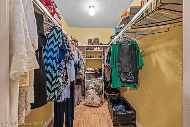 112179 S 4776th Rd, Muldrow, OK 74948 - walk in closet featuring wood finished floors