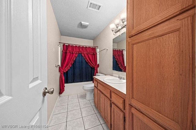 112179 S 4776th Rd, Muldrow, OK 74948 - bathroom with vanity, toilet, tile patterned flooring, shower / bath combination with curtain, and a textured ceiling