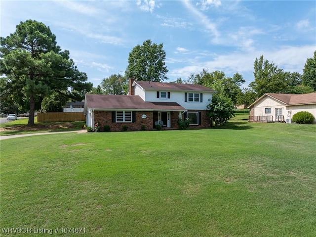 view of front property featuring a front lawn