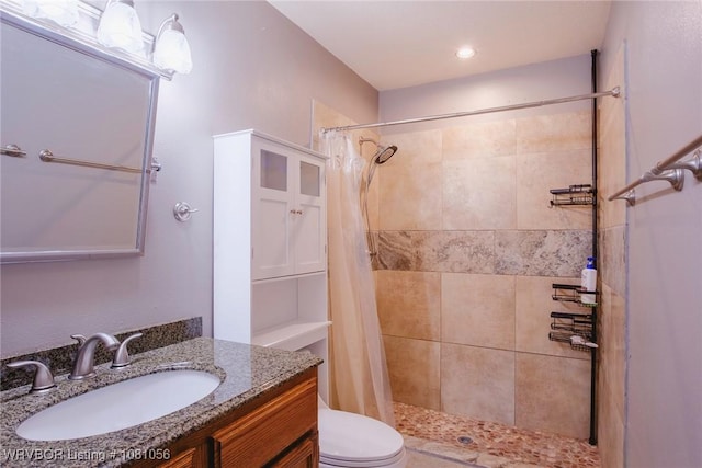 1515 M Cir, Barling, AR 72923 - bathroom featuring a tile shower, toilet, and vanity