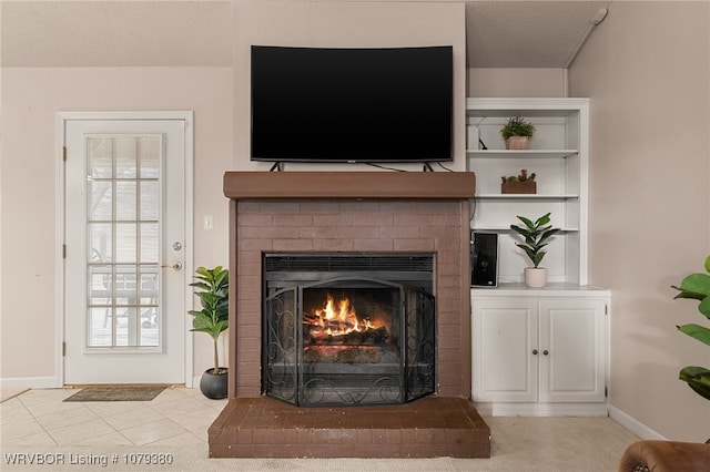 room details with a brick fireplace and baseboards