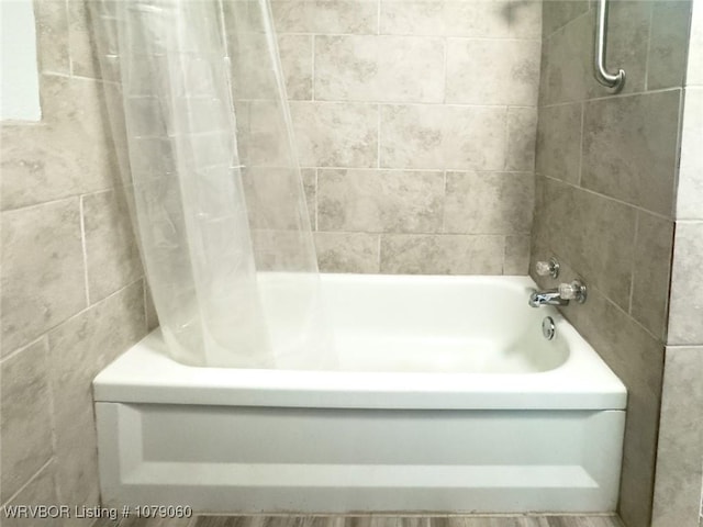 full bath featuring shower / bath combination with curtain