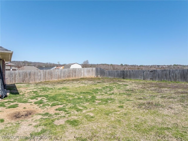 view of yard with fence