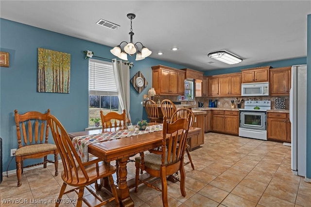 dining room featuring recessed lighting, visible vents, a chandelier, and light tile patterned flooring