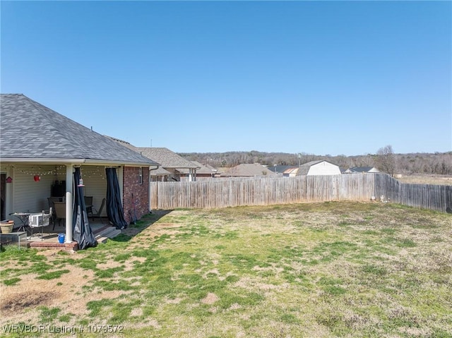 view of yard with fence