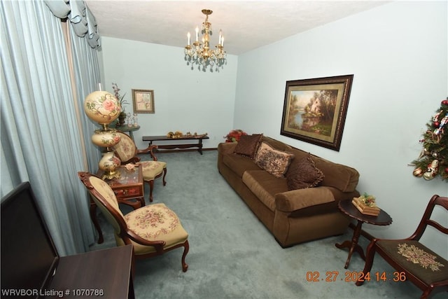 living room with a chandelier and carpet flooring