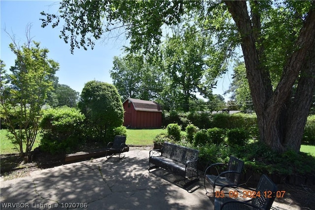 view of patio with a shed