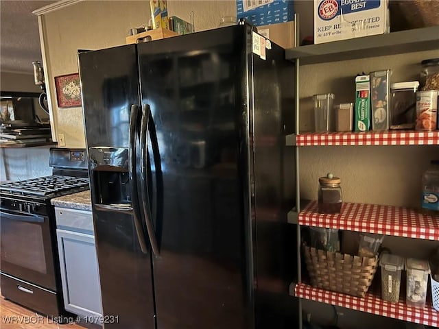 kitchen with black appliances