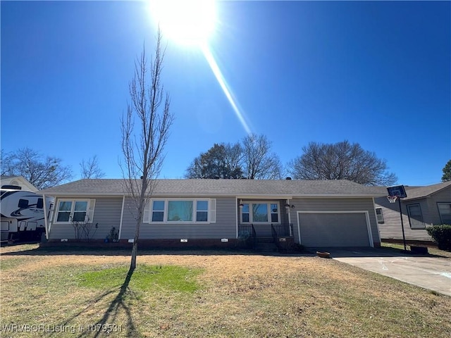 ranch-style house with crawl space, concrete driveway, a garage, and a front yard