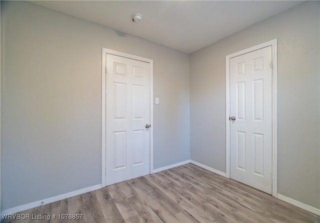 empty room featuring light hardwood / wood-style floors