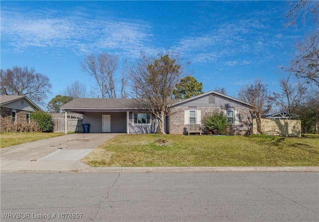 single story home featuring a carport and a front lawn