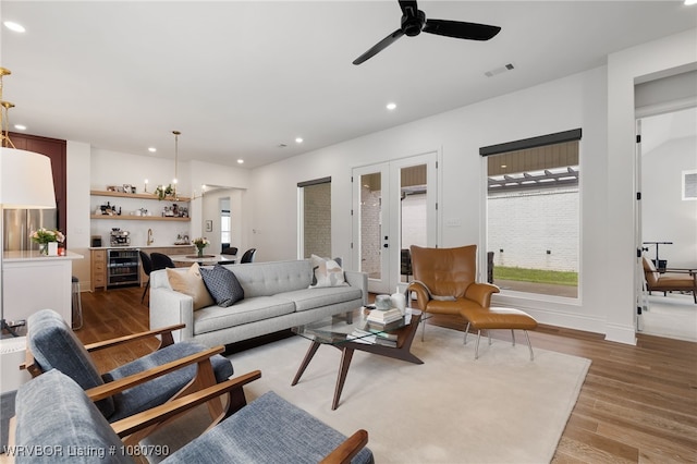 9101 Birkshire Pl, Fort Smith, AR 72916 - living area featuring french doors, light wood-type flooring, visible vents, ceiling fan, and recessed lighting