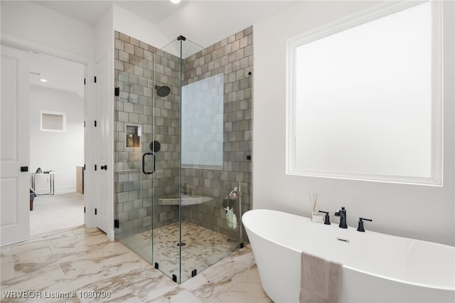 9101 Birkshire Pl, Fort Smith, AR 72916 - bathroom with recessed lighting, marble finish floor, a stall shower, and a freestanding tub
