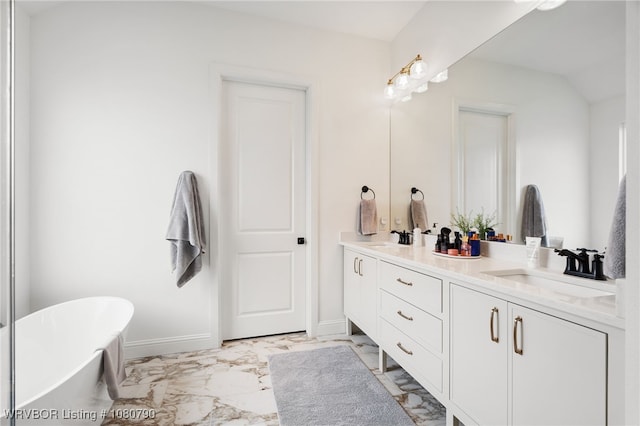 9101 Birkshire Pl, Fort Smith, AR 72916 - full bathroom with double vanity, marble finish floor, a freestanding bath, and a sink