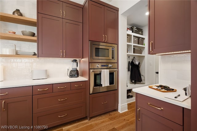 9101 Birkshire Pl, Fort Smith, AR 72916 - kitchen with light wood-style floors, open shelves, appliances with stainless steel finishes, and decorative backsplash
