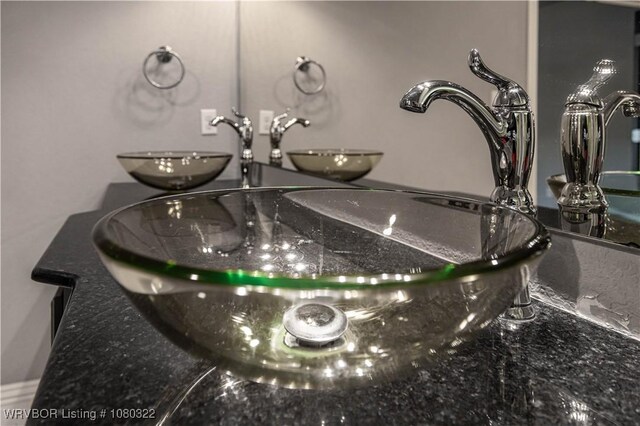 interior details featuring a sink