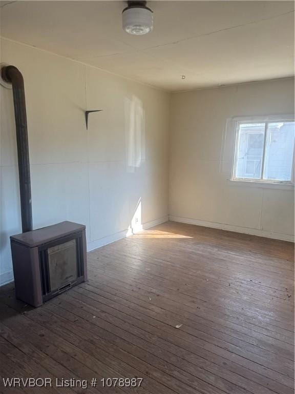 unfurnished living room with dark hardwood / wood-style floors