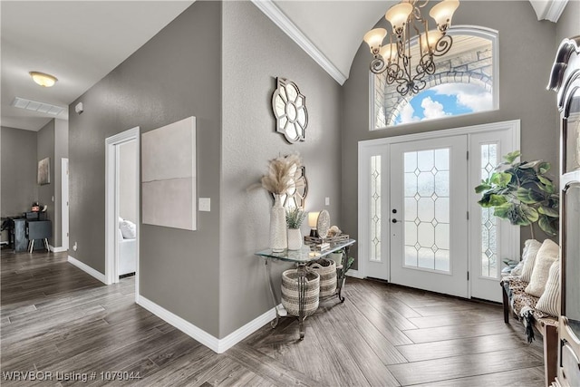 2601 Bugscuffle Rd, Lavaca, AR 72941 - entrance foyer with a chandelier, plenty of natural light, wood finished floors, and high vaulted ceiling