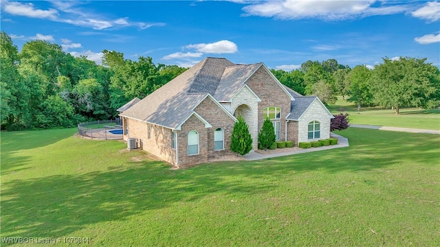 2601 Bugscuffle Rd, Lavaca, AR 72941 - view of front facade featuring a front yard, stone siding, and brick siding