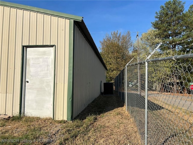 view of property exterior featuring central AC