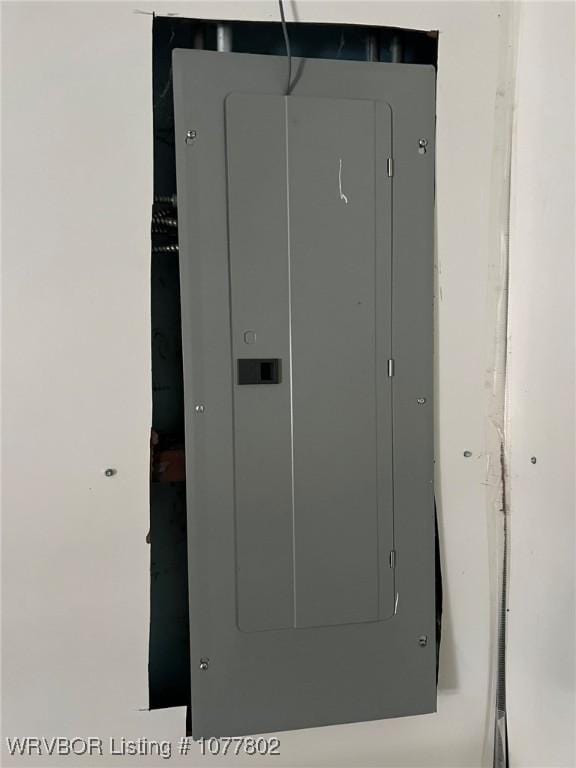 utility room with electric panel