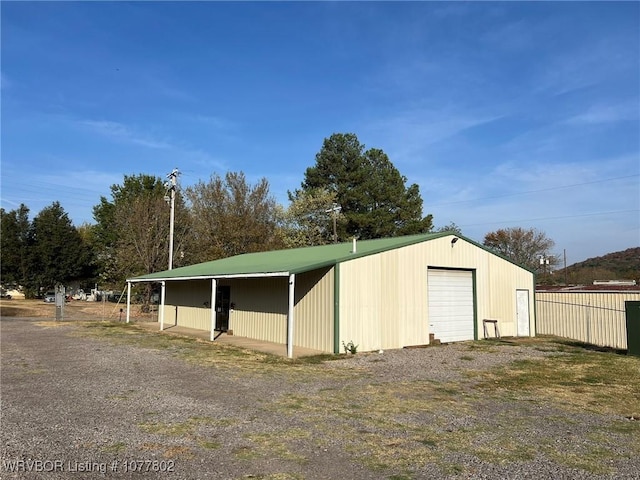 view of outdoor structure featuring a garage