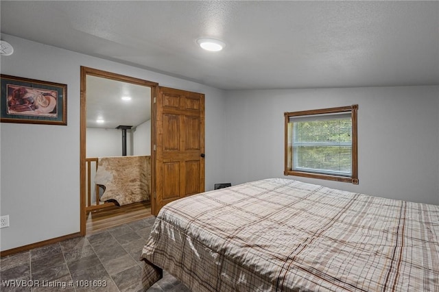 11667 Falling Rock Rd, Havana, AR 72842 - bedroom with baseboards